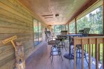 Chase`s cabin deck with views and dining area. 